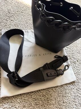 Charles & Keith Black Leather Bucket Bag with Chain Handle and Adjustable Strap